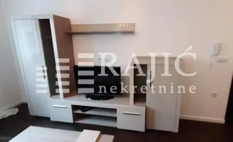 Living room with furniture and television. - image 2