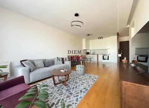 Living room connected to the dining area and kitchen. - image 3