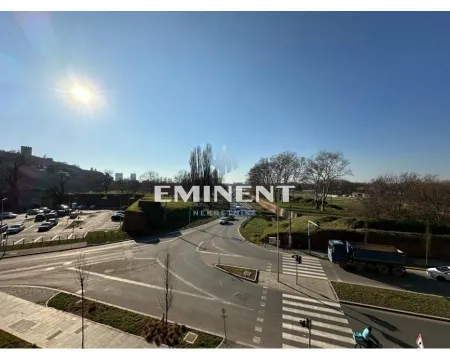 View from the window overlooking the street and surrounding landscape. - image 18