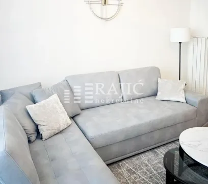 Bright living room with a corner sofa. - image 4