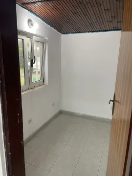 Empty room with light walls and tiled floor. - image 3