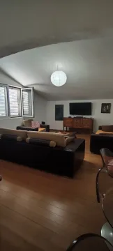 Spacious living room with sofa set and TV. - image 7
