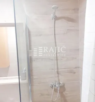 View of the shower cabin in a modern bathroom. - image 6