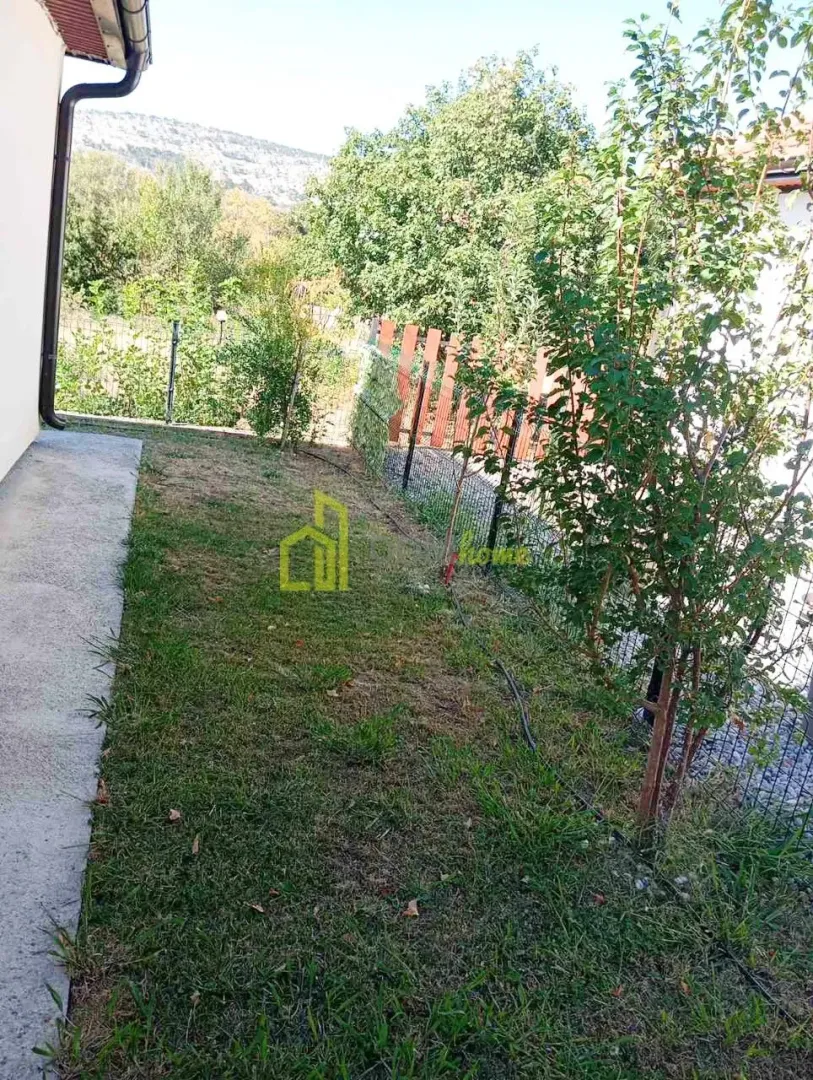 View of the yard and green areas around the house.