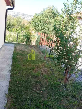 View of the yard and green areas around the house. - image 4