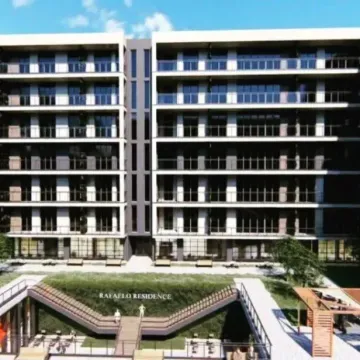 Pogled na spoljašnjost moderne stambene zgrade sa uređenim dvorištem. - image 13
