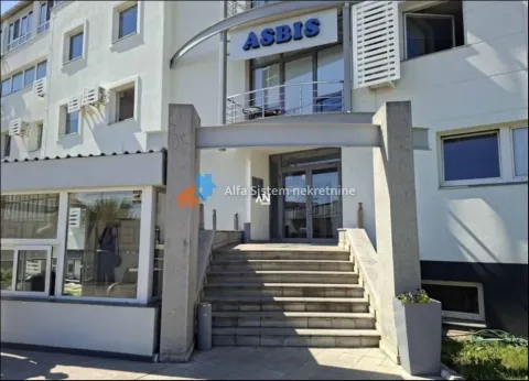 Main entrance to the office building with stairs and a sign. - image 18