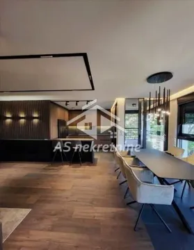 Modern living room with dining area and open kitchen. - image 11