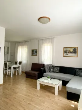 Living room connected to the dining area and kitchen. - image 8