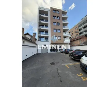 Facade of the residential building with a parking lot in the yard. - image 2