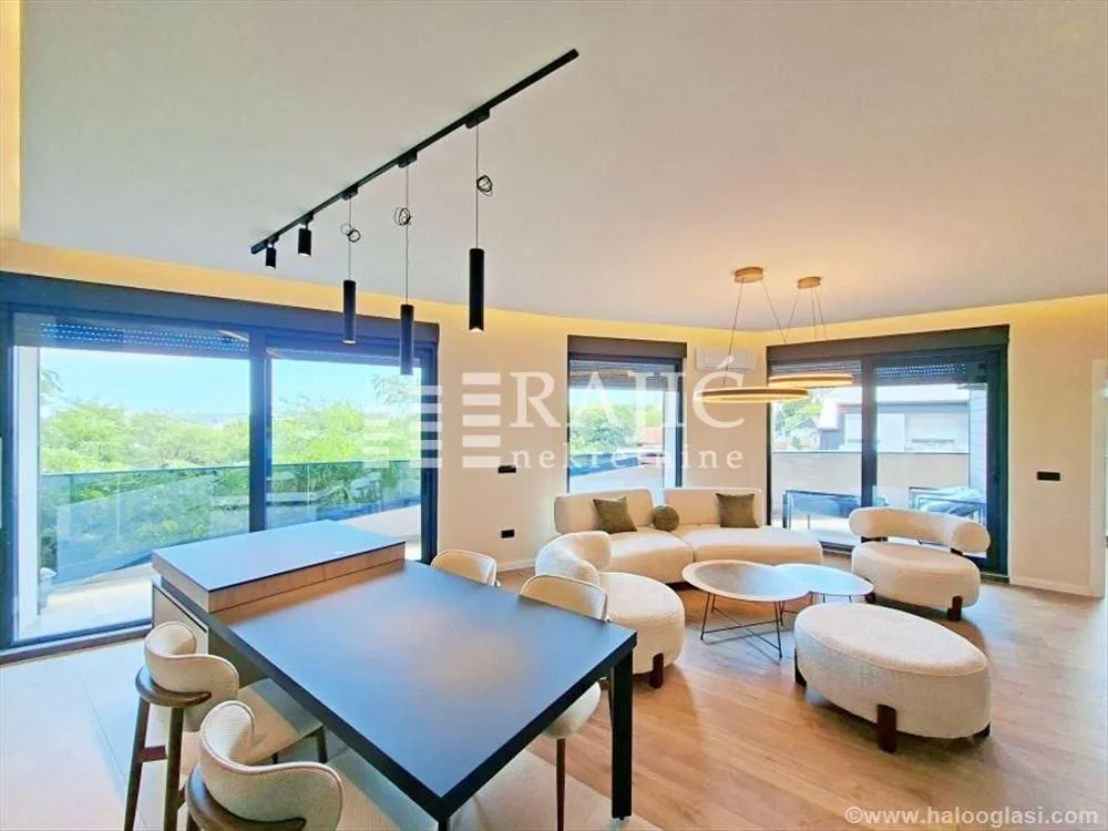 Spacious living room with a dining area and modern furniture.