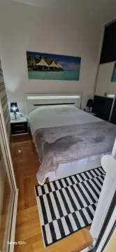 Furnished bedroom with a double bed. - image 19