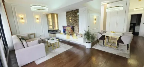 Prostrani dnevni boravak sa trpezarijom i modernim nameštajem. - image 2
