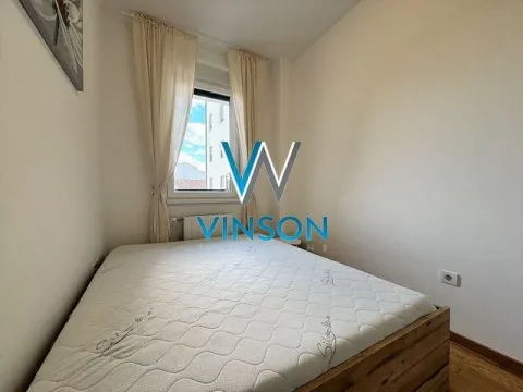 Smaller bedroom with a double bed and a window. - image 10