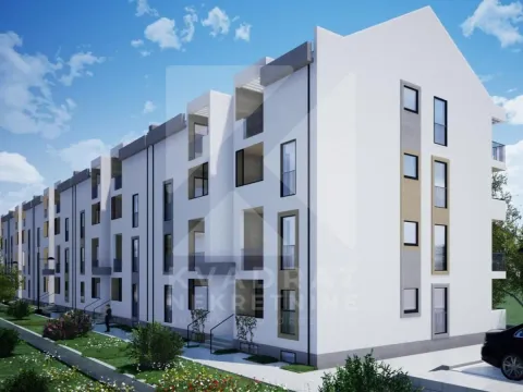 Spoljašnji izgled moderne stambene zgrade sa uređenim dvorištem. - image 3