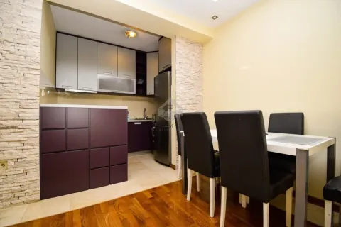 Kitchen with dining area and modern furniture. - image 5