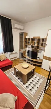 Dnevna soba sa garniturom, TV policom i stočićem. - image 3