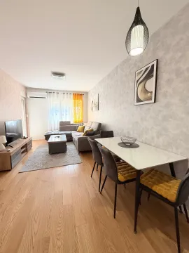 Spacious living room with a dining area and modern furniture. - image 3