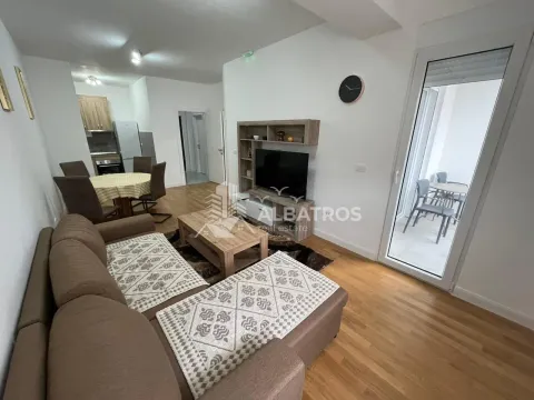 Living room with sofa, dining area, and access to the terrace. - image 2