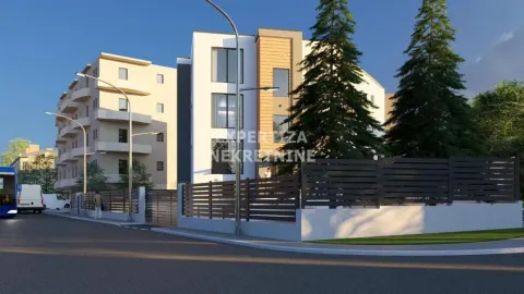 Exterior view of a residential building with a yard and fence. - image 2