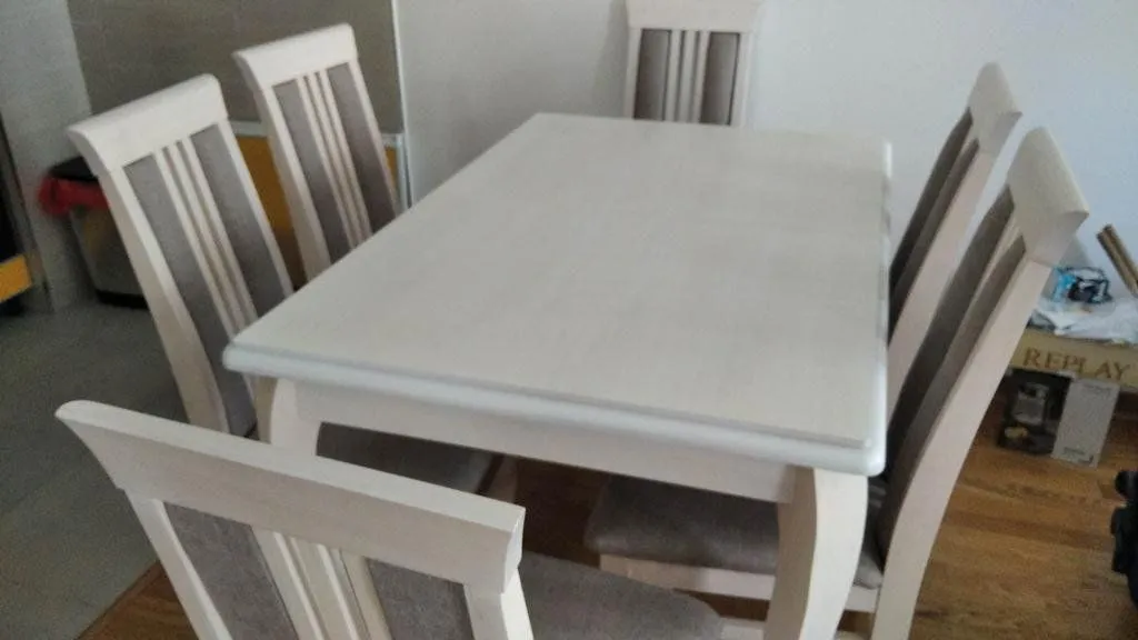 Dining table with chairs in the interior.
