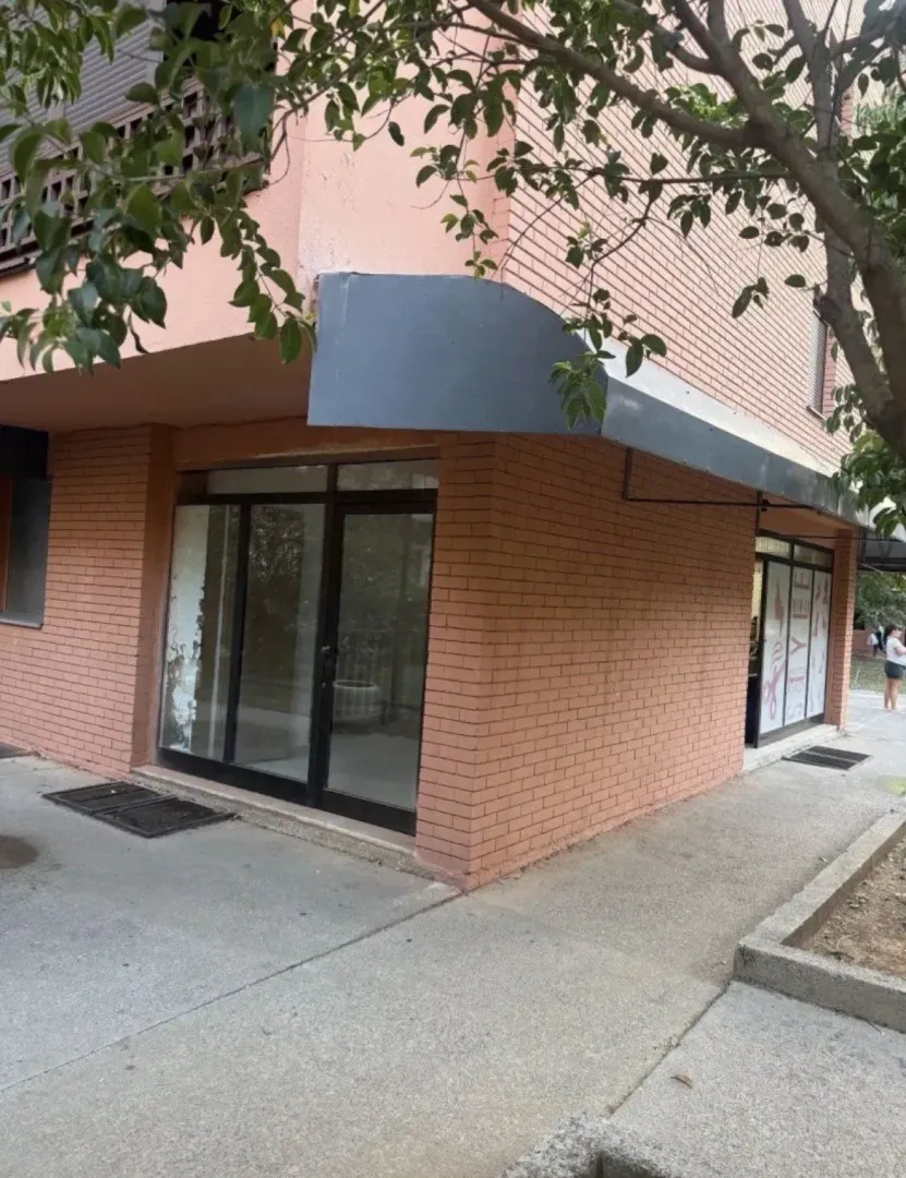 Exterior view of the building with ground floor commercial space.