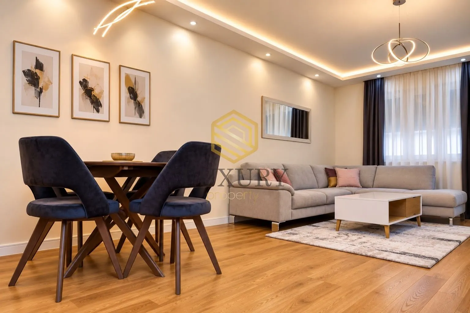 Living room with dining area and modern furniture.
