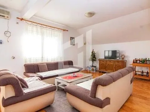 Living room with sofa set, coffee table and television. - image 5