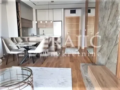 Modern living room with dining area and kitchen in the background. - image 5