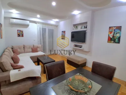 Spacious living room with a sofa set and dining table. - image 5