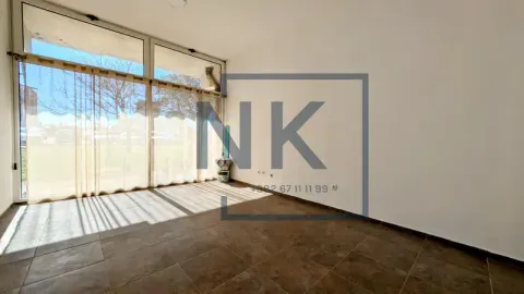 Empty room with large glass windows and tiled flooring. - image 4