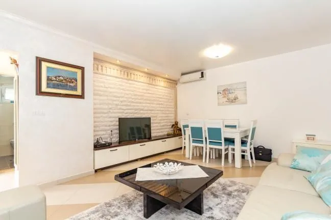 Spacious living room with a dining area and modern furniture.