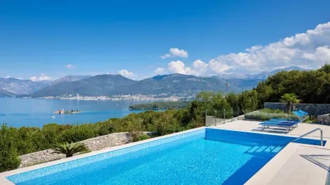 Swimming pool with a view of the sea and mountains. - image 19