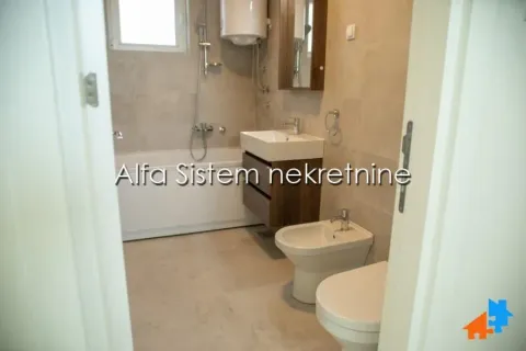 Equipped bathroom with bathtub, washbasin, and sanitary fixtures. - image 6