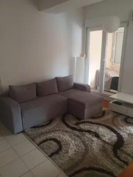 Bright living room with a corner sofa and access to the balcony. - image 15