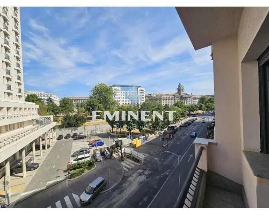 View from the terrace overlooking the street and city park.