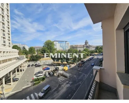 View from the terrace overlooking the street and city park. - image 10