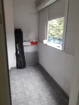 Enclosed balcony with grey floor tiles. - image 14