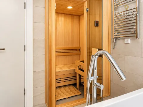 Wooden sauna within a modern bathroom with a bathtub. - image 7