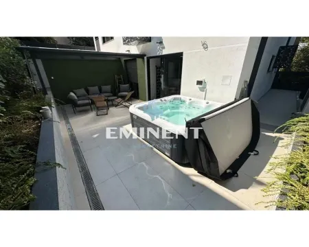 Terrace with a hot tub and seating set in the house yard. - image 16