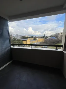 View of the surrounding buildings from a residential balcony. - image 10