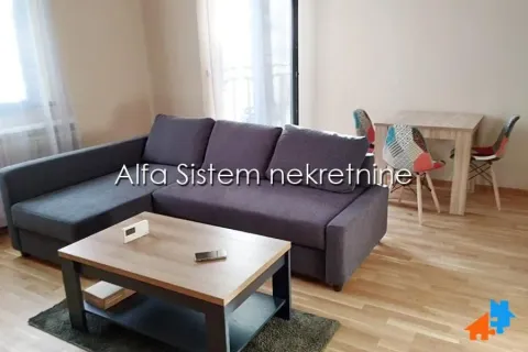 Living room with a sectional sofa, coffee table, and dining area. - image 5