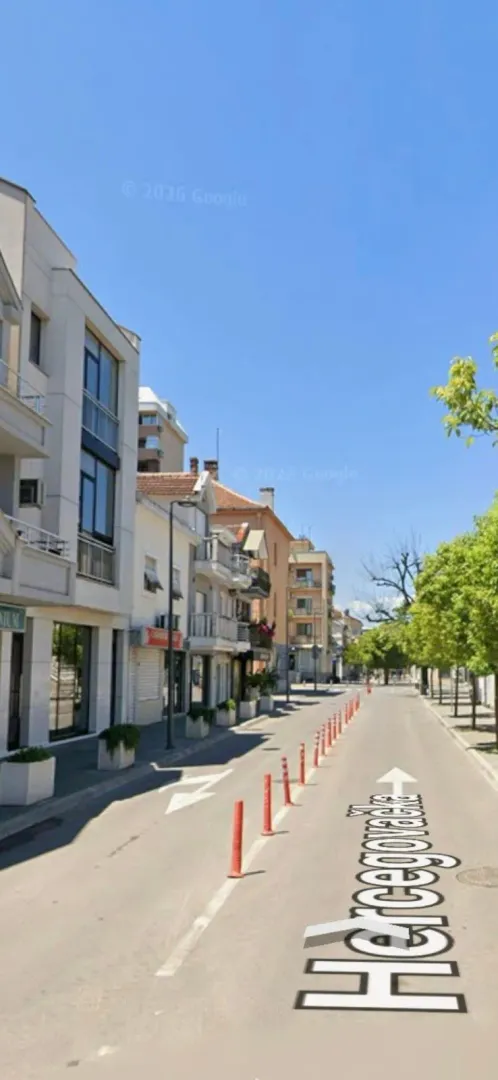 View of the street and surrounding buildings.
