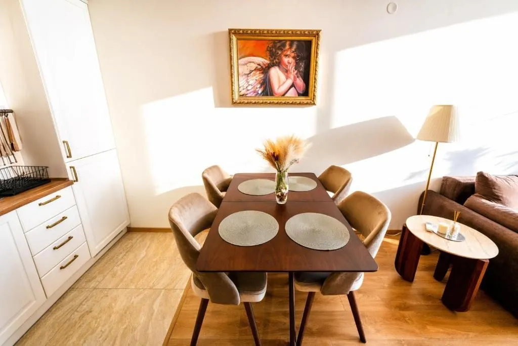 Living room with a dining table and chairs.
