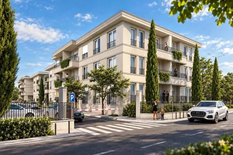Spoljašnji izgled stambene zgrade sa parkingom i uređenim dvorištem. - image 2