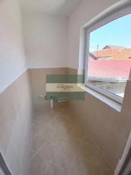 Empty room with tiled floor and walls and a window. - image 8