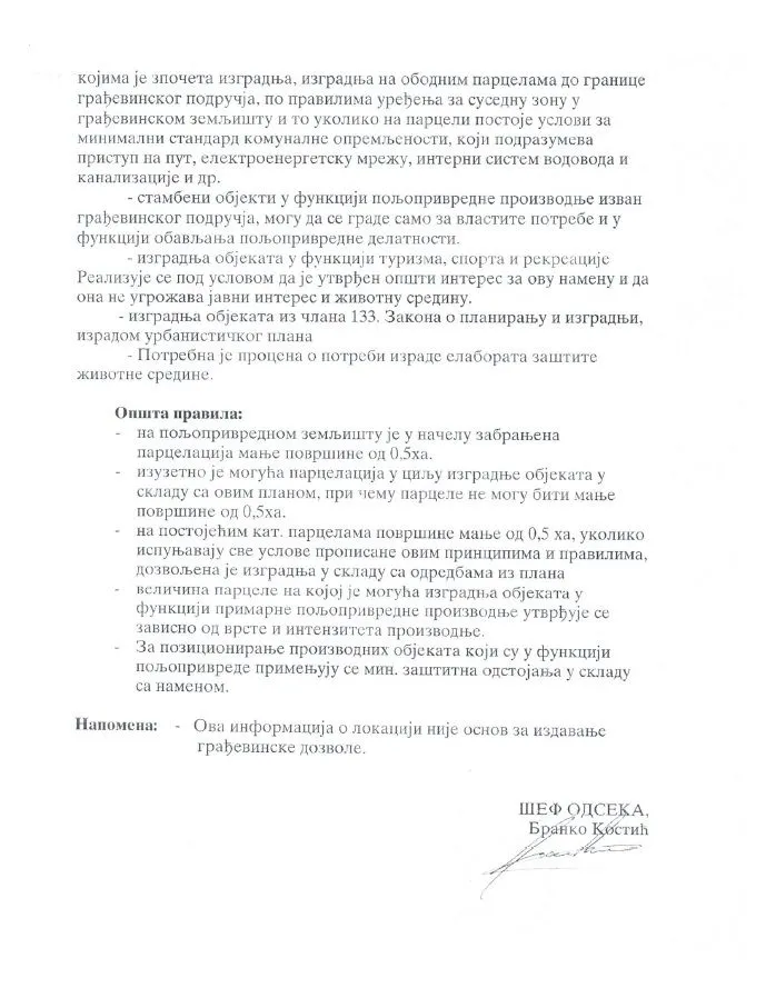 Dokument sa tekstom i urbanističkim uslovima na papiru.