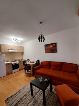Living room connected to the kitchen and dining area. - image 5