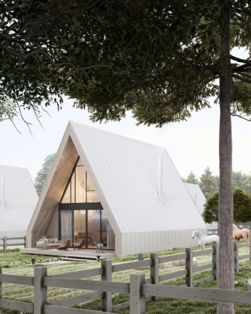 Exterior of a modern A-frame mountain house with a terrace.