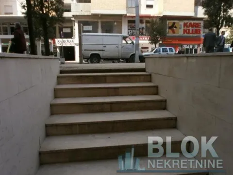 Entrance stairs with a view of the street and surrounding buildings. - image 5